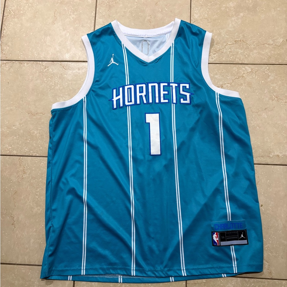 Jordan Teal Hornets Jersey with White Highlights